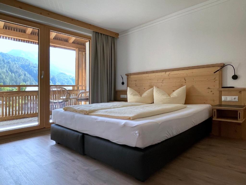 Posteľ alebo postele v izbe v ubytovaní Hotel & Suites Glück Auf