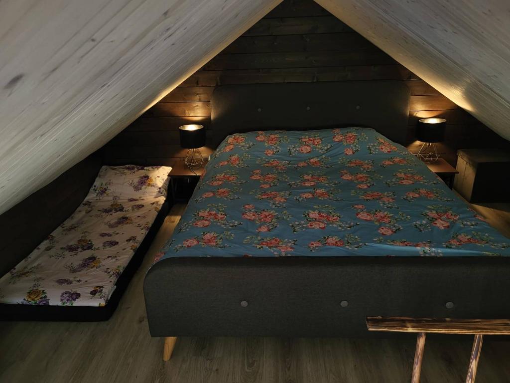 Postel nebo postele na pokoji v ubytování Tiny house near Viljandi lake