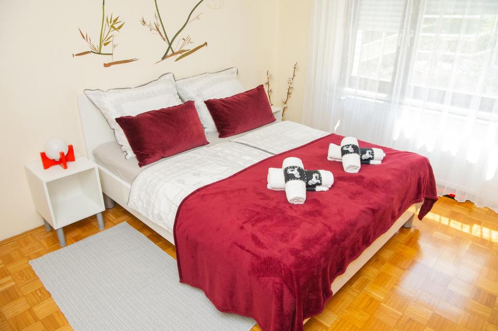 Postel nebo postele na pokoji v ubytování Apartment Karlie