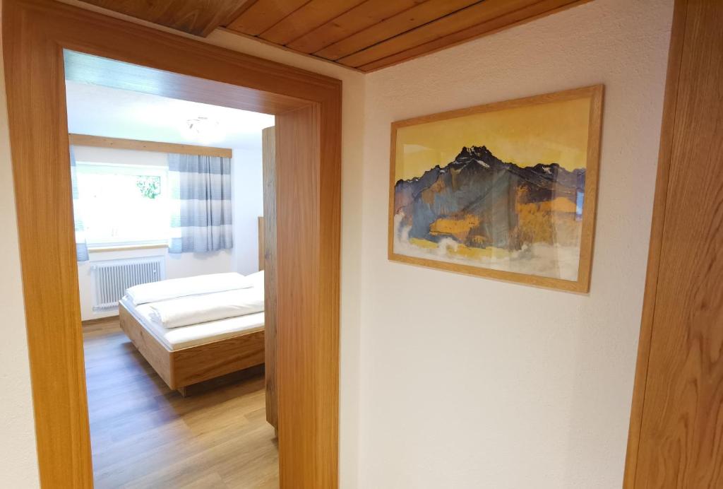 Postel nebo postele na pokoji v ubytování Gästehaus Scherl