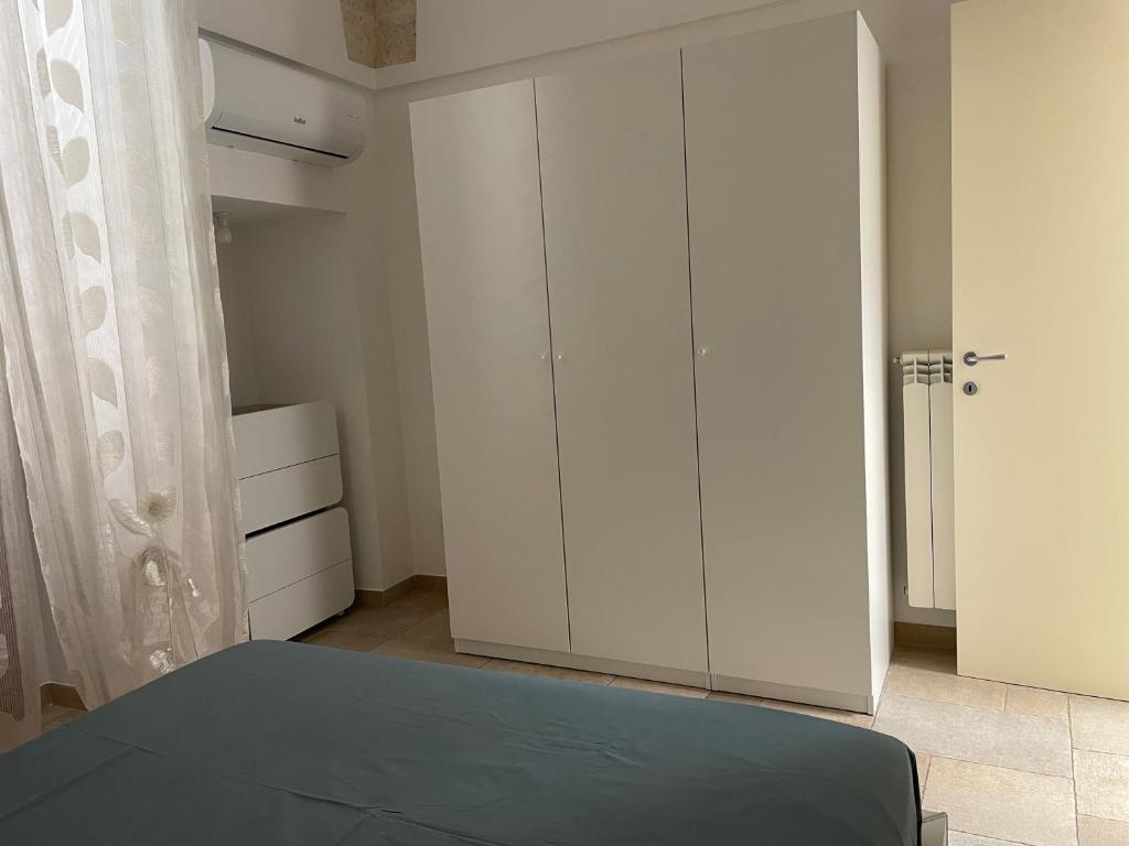 Posteľ alebo postele v izbe v ubytovaní Casa Oberdan - private parking