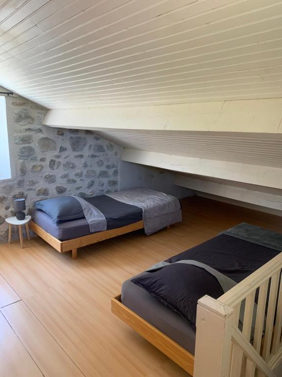 Postel nebo postele na pokoji v ubytování Gîte du Vallier