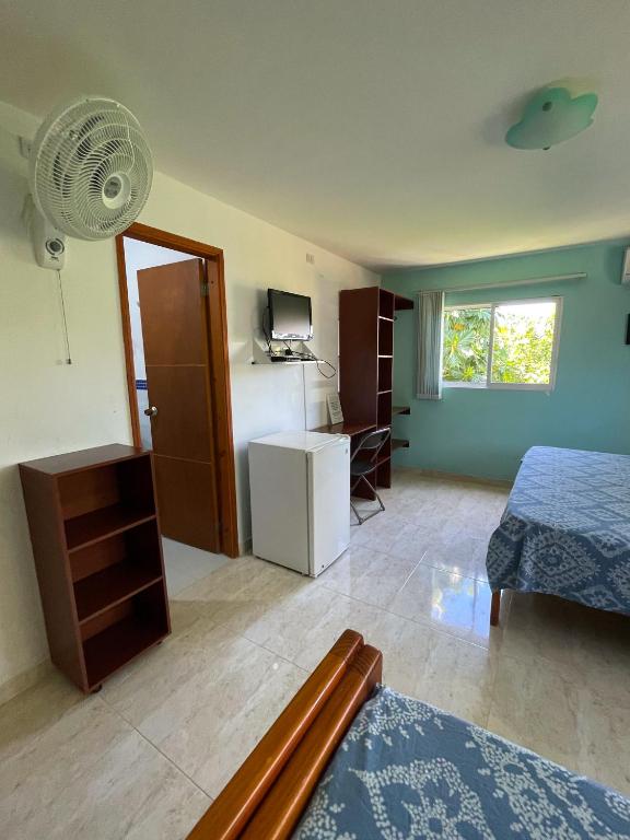 Postel nebo postele na pokoji v ubytování Posada Nativa Bernard Place