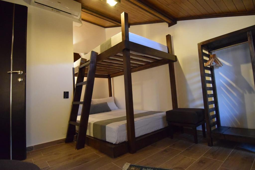 Postel nebo postele na pokoji v ubytování KALE GUESTHOUSE