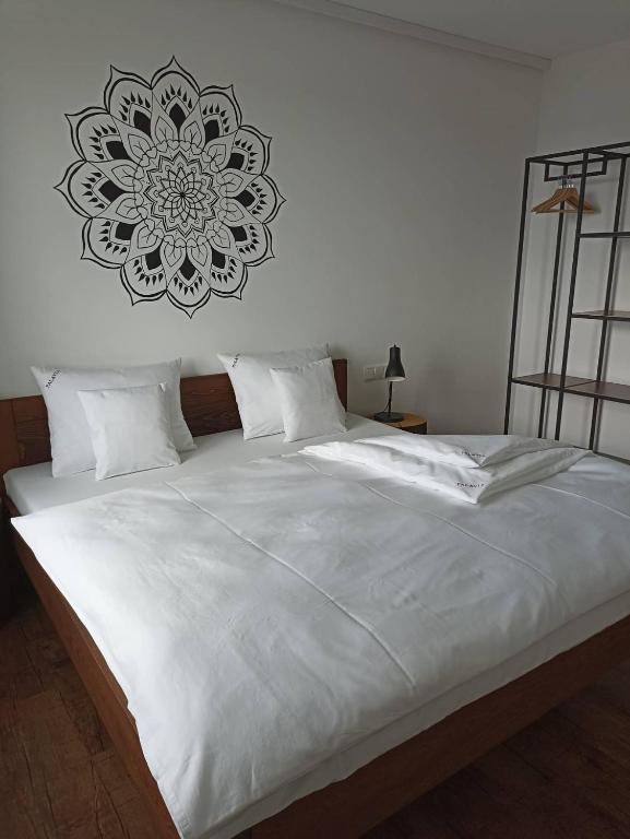 Postel nebo postele na pokoji v ubytování PALAVIA Apartments