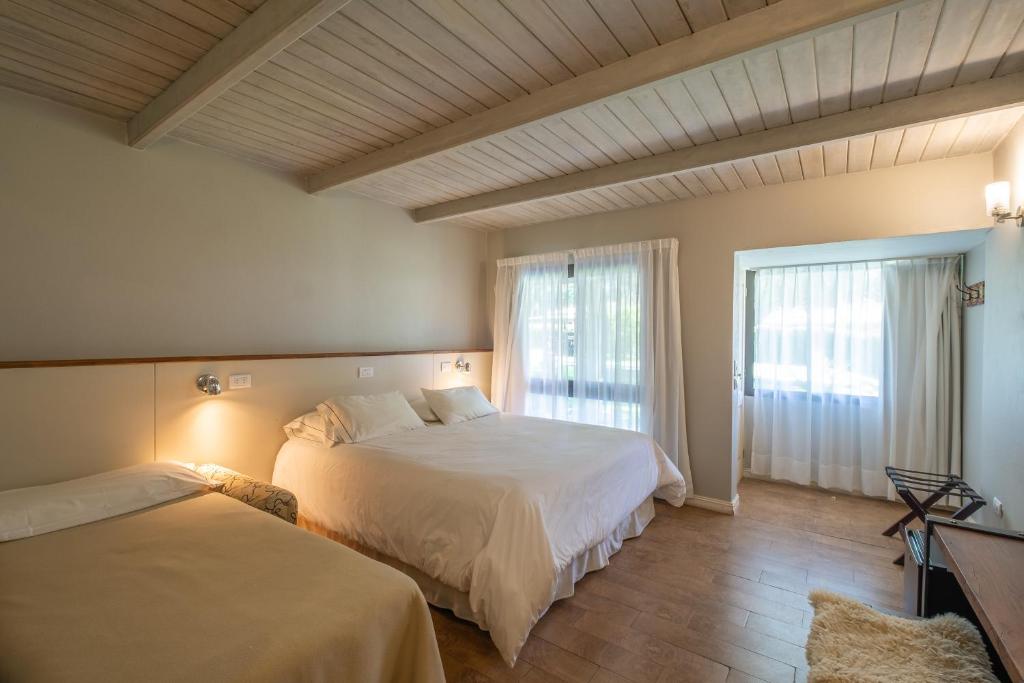 Katil atau katil-katil dalam bilik di Atelier Hotel de Charme