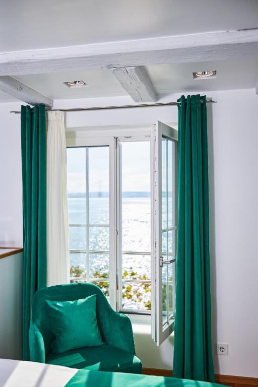 Postel nebo postele na pokoji v ubytování Hotel Max am See