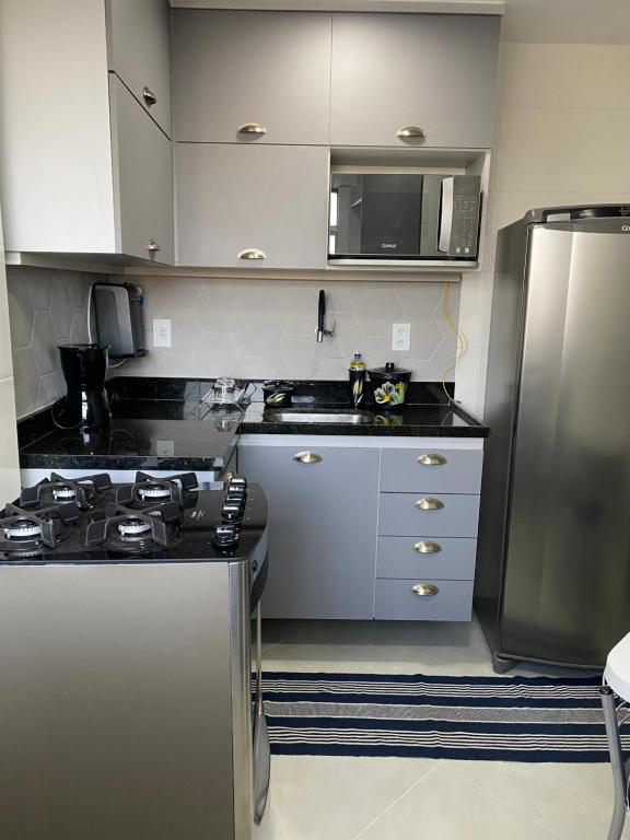 Apartamento novo ao lado do Rio Centro! - Departamento
