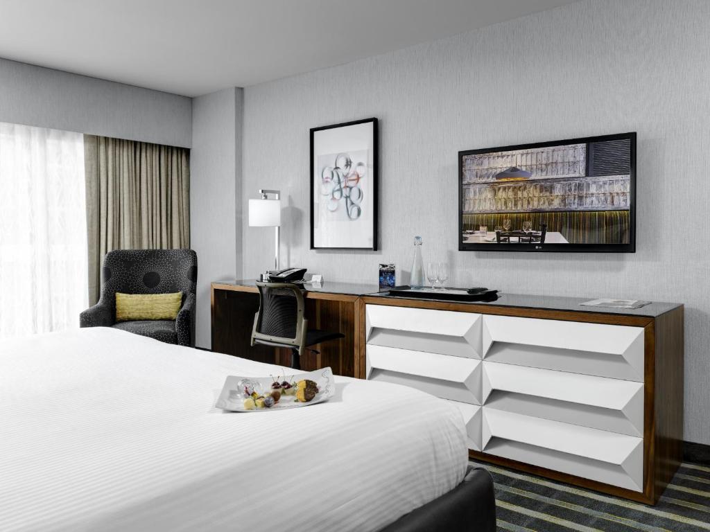 Postel nebo postele na pokoji v ubytování Hotel Arts