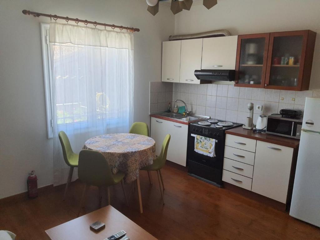 Kuchnia lub aneks kuchenny w obiekcie Ionian Grand - Apartments