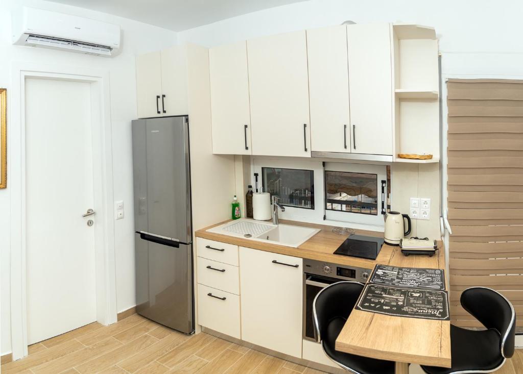 Kuchyň nebo kuchyňský kout v ubytování Modern studio Chiou