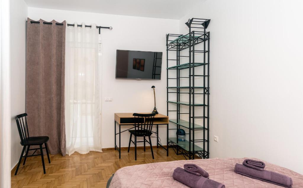 Postel nebo postele na pokoji v ubytování Modern studio Chiou