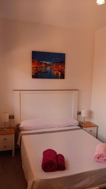Posteľ alebo postele v izbe v ubytovaní Merlo's Gaviotas. (Apartamento).