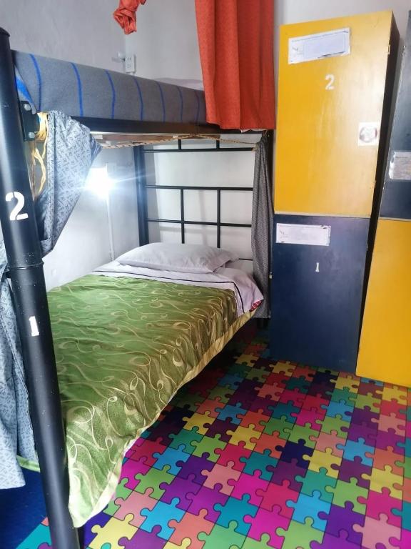 Postel nebo postele na pokoji v ubytování Hostal Gastro Bar Casa Colibrí