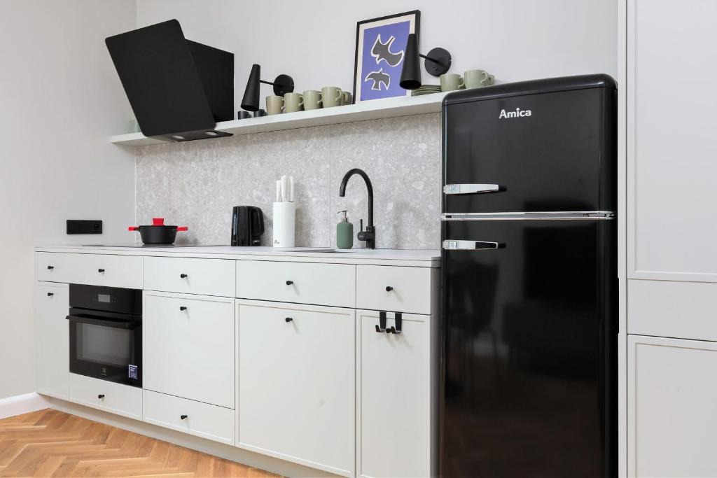 Kuchyňa alebo kuchynka v ubytovaní Warszawa Bohema Szwedzka Apartment by Noclegi Renters