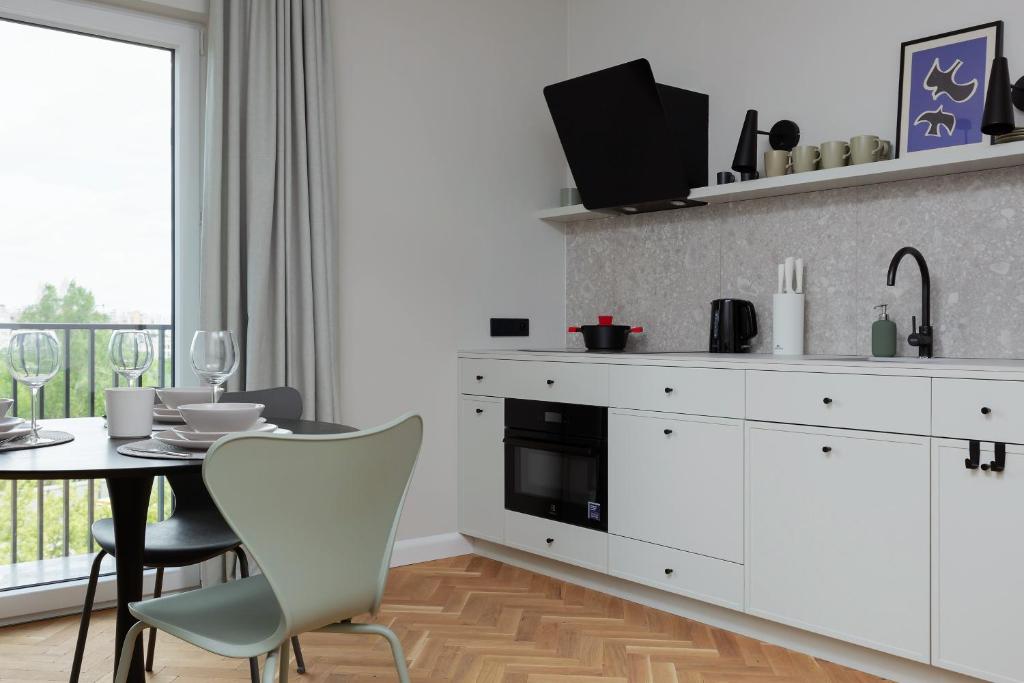 Kuchyňa alebo kuchynka v ubytovaní Warszawa Bohema Szwedzka Apartment by Noclegi Renters