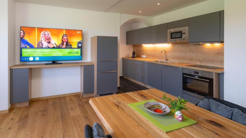 Kuchyňa alebo kuchynka v ubytovaní Apartments Presslauer - Mori