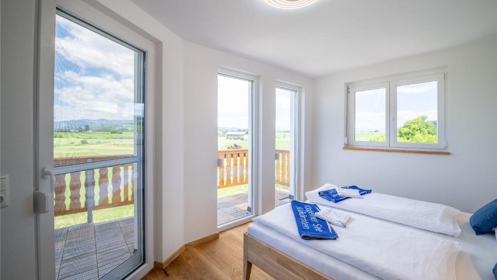 Posteľ alebo postele v izbe v ubytovaní Apartments Presslauer - Mori
