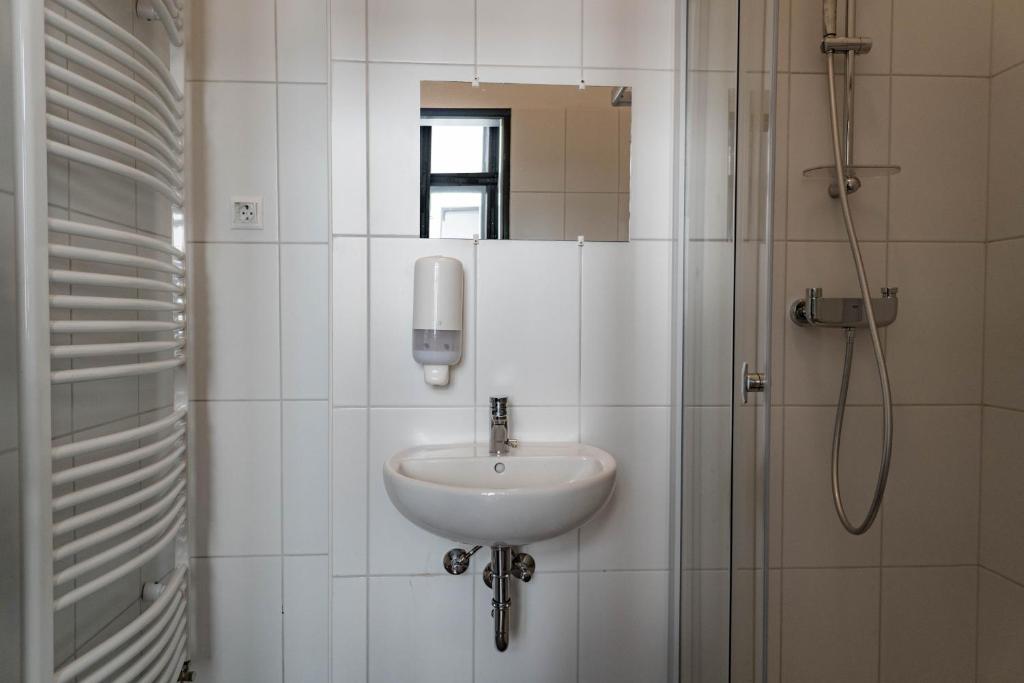 Koupelna v ubytování Equity Point Budapest