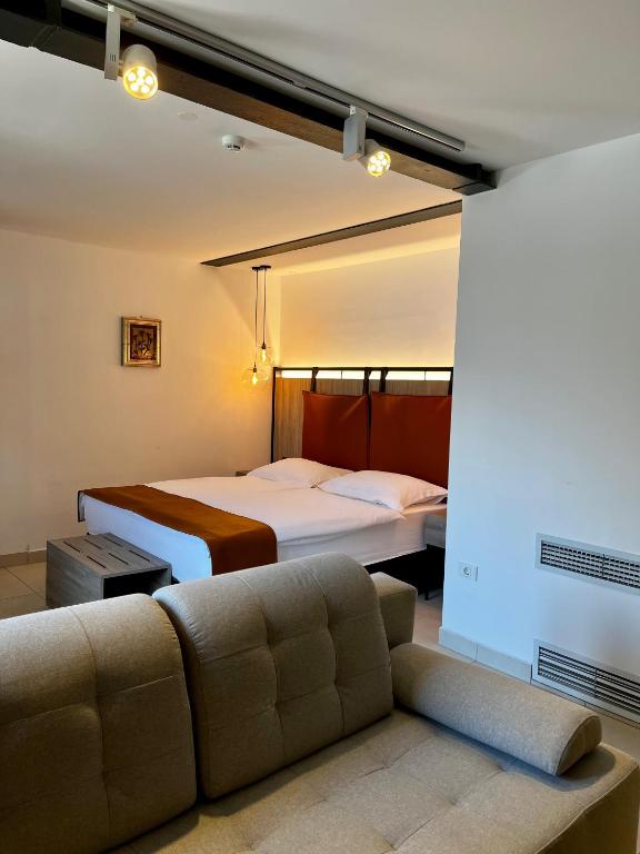 Postel nebo postele na pokoji v ubytování VENEZIANA Boutique Hotel Superior