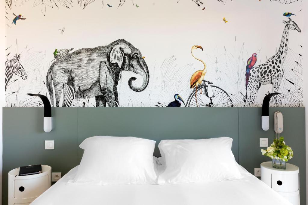 Postel nebo postele na pokoji v ubytování Hotel Alcyon