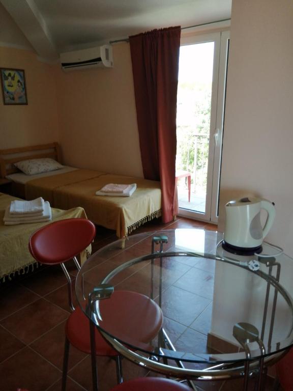 Postel nebo postele na pokoji v ubytování Apartments Adriatika