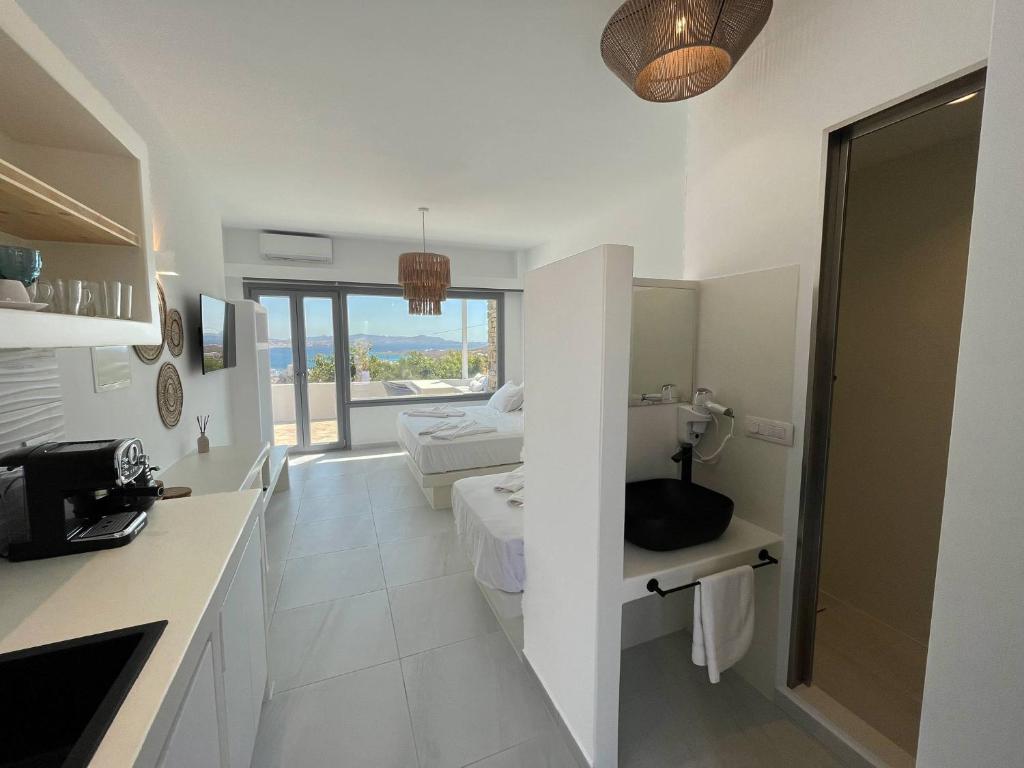 Kuchyň nebo kuchyňský kout v ubytování 3Waves Sea View Paros