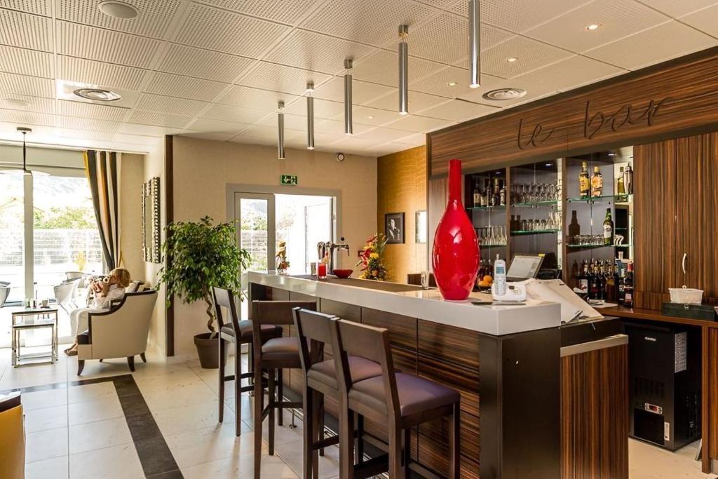 Reštaurácia alebo iné gastronomické zariadenie v ubytovaní Appart'S Seynod-Annecy