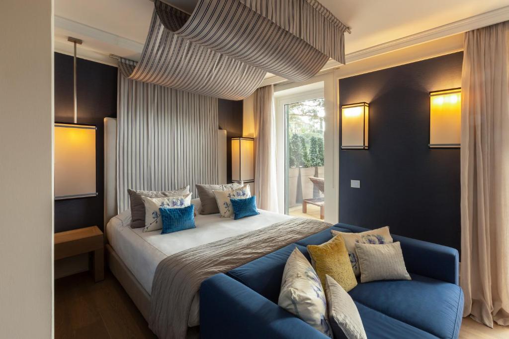 Postel nebo postele na pokoji v ubytování Eight Hotel Paraggi