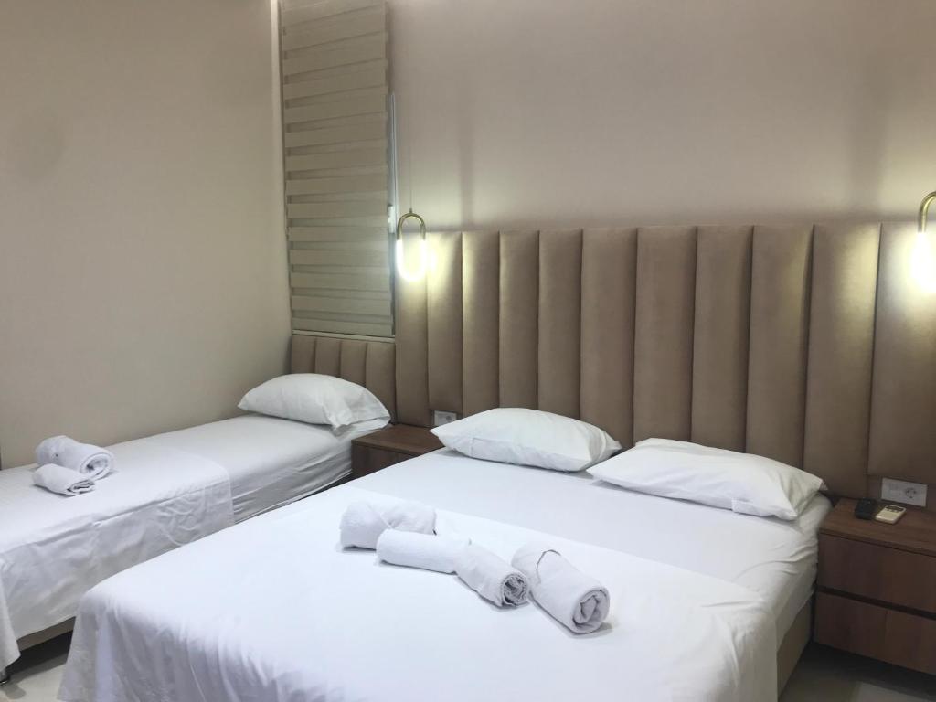 Postel nebo postele na pokoji v ubytování Apartments Ada Bojana