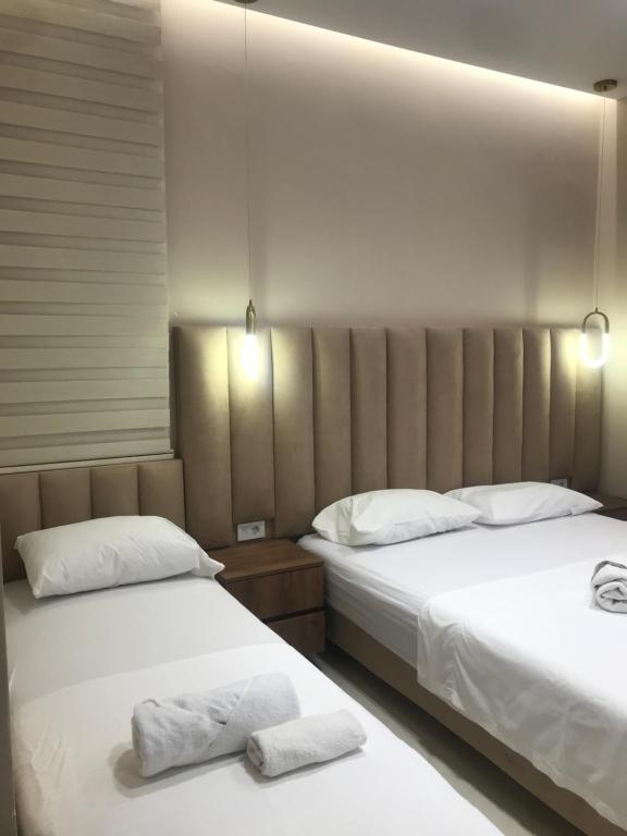 Postel nebo postele na pokoji v ubytování Apartments Ada Bojana