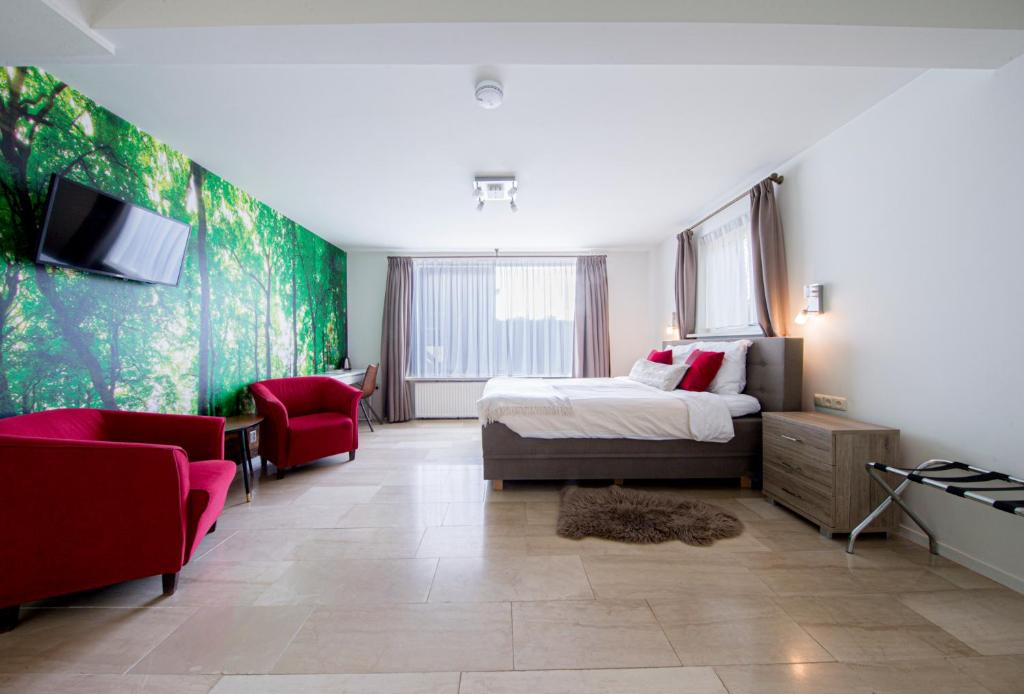 Postel nebo postele na pokoji v ubytování Hotel-Restaurant de Boer'nkinkel