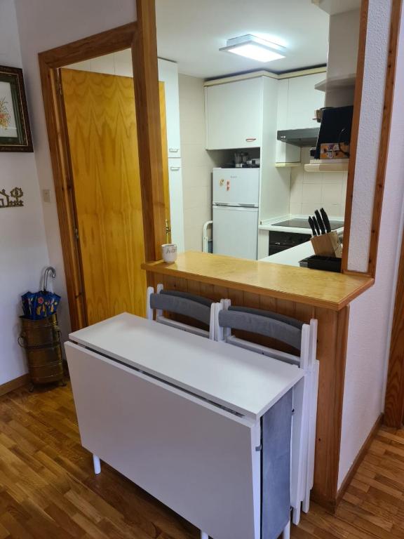 Kuchyň nebo kuchyňský kout v ubytování Apartamento en Panticosa