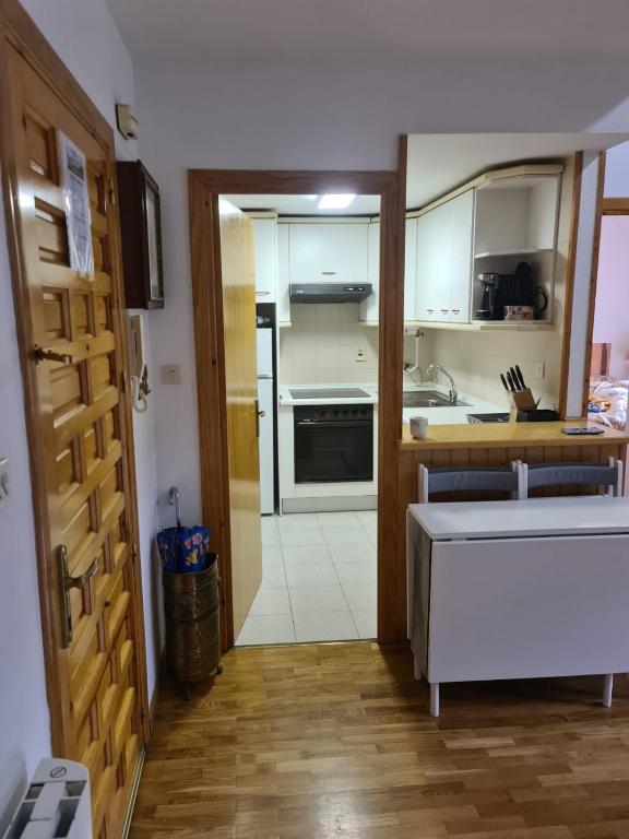 Kuchyň nebo kuchyňský kout v ubytování Apartamento en Panticosa