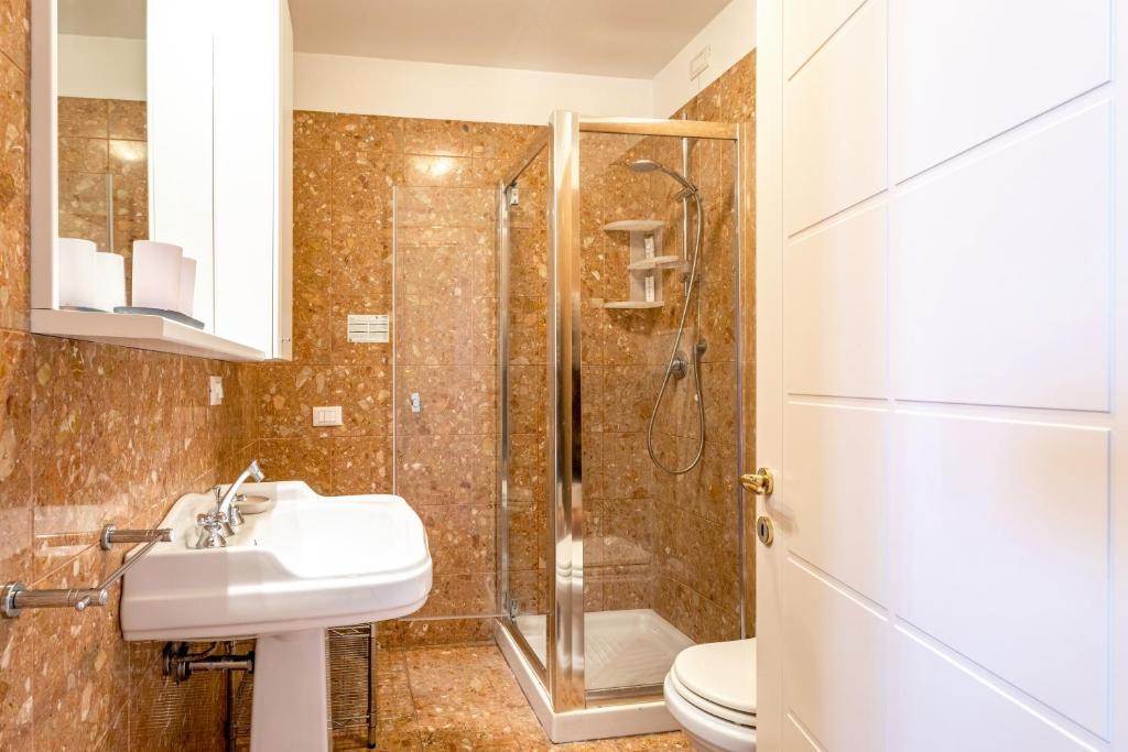 Kúpeľňa v ubytovaní Molino Stucky Residence Burchio Suite