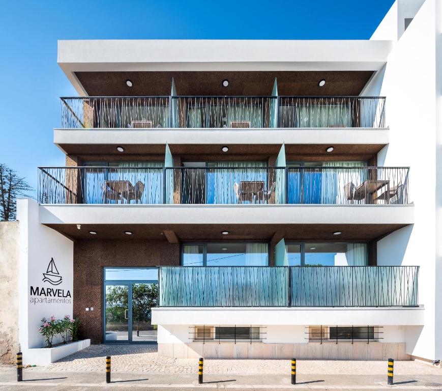 a facade of a building with a balcony at Apartamentos Marvela in Lagos