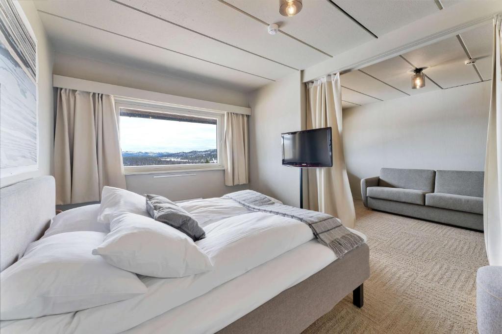 Postel nebo postele na pokoji v ubytování Ranten Hotell Best Western Signature Collection