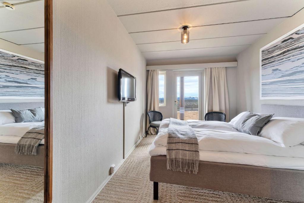 Postel nebo postele na pokoji v ubytování Ranten Hotell Best Western Signature Collection