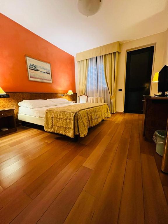 Posteľ alebo postele v izbe v ubytovaní Hotel Motel Europa