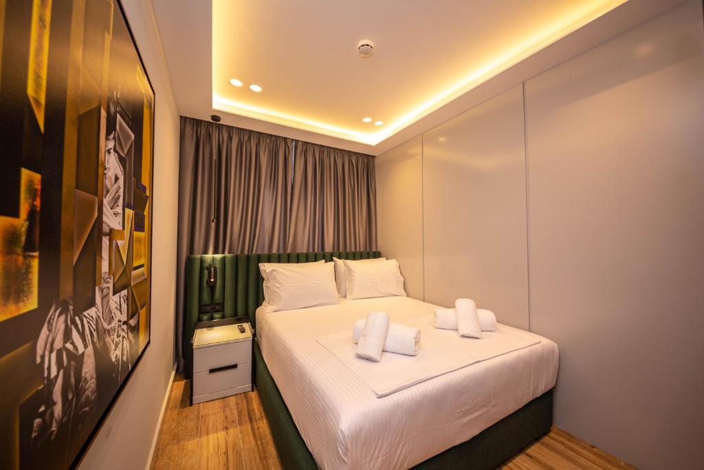 Postel nebo postele na pokoji v ubytování Hotel Lili-1