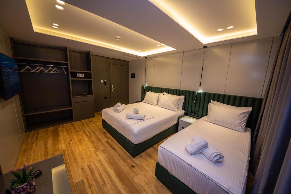 Postel nebo postele na pokoji v ubytování Hotel Lili-1