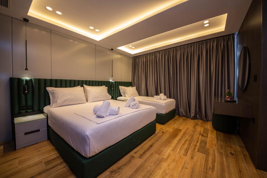 Postel nebo postele na pokoji v ubytování Hotel Lili-1