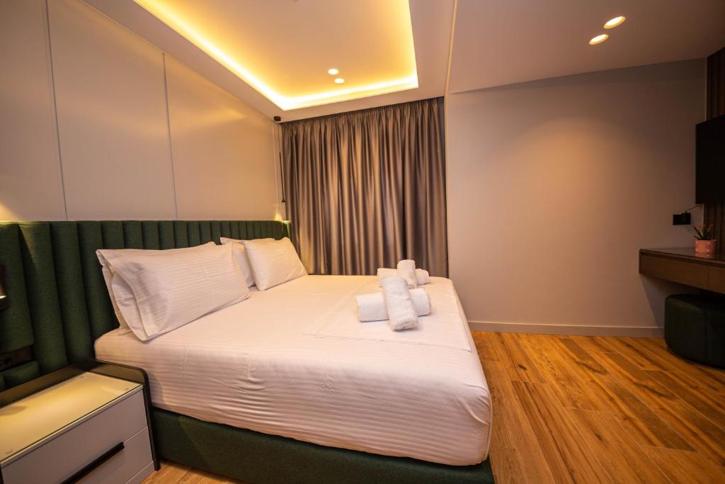 Postel nebo postele na pokoji v ubytování Hotel Lili-1