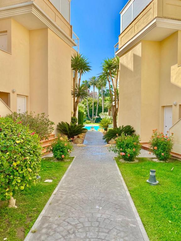 Zahrada ubytování Alicante Golf Hoyo 18 4-6 Pax. piscina, wifi, parking privado.