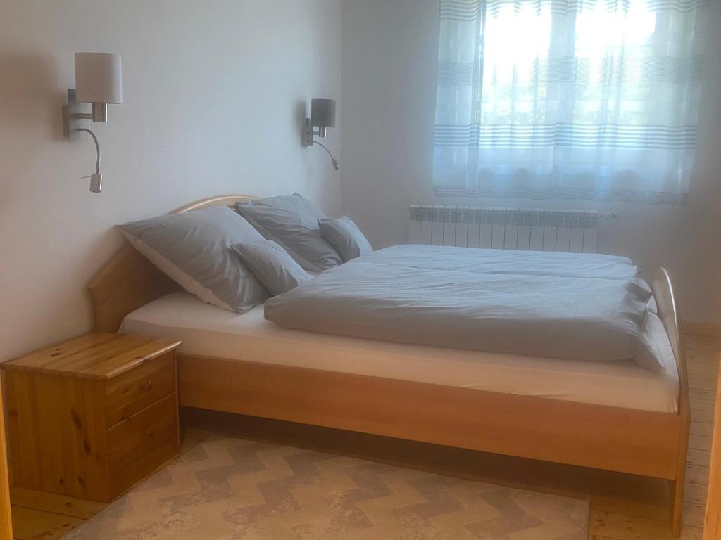 Postel nebo postele na pokoji v ubytování Chybotek Premium
