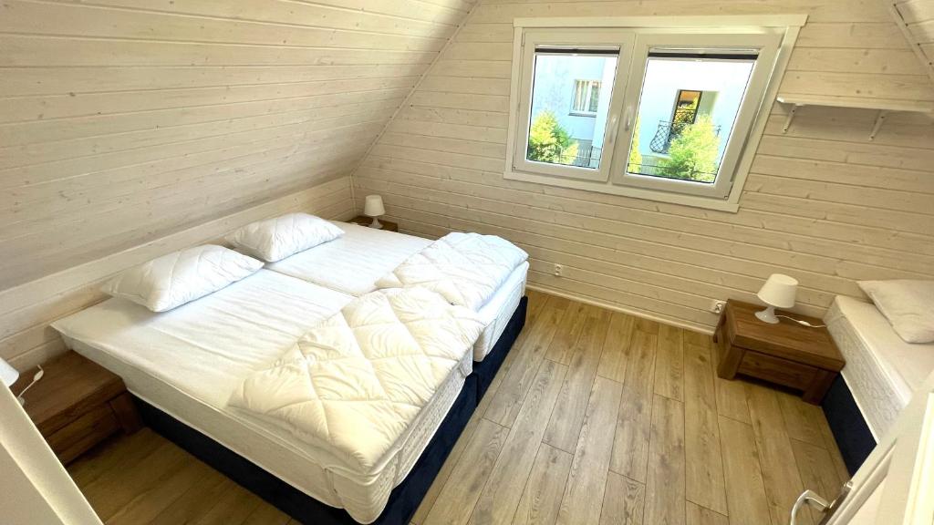 Postel nebo postele na pokoji v ubytování Ośrodek Polaris