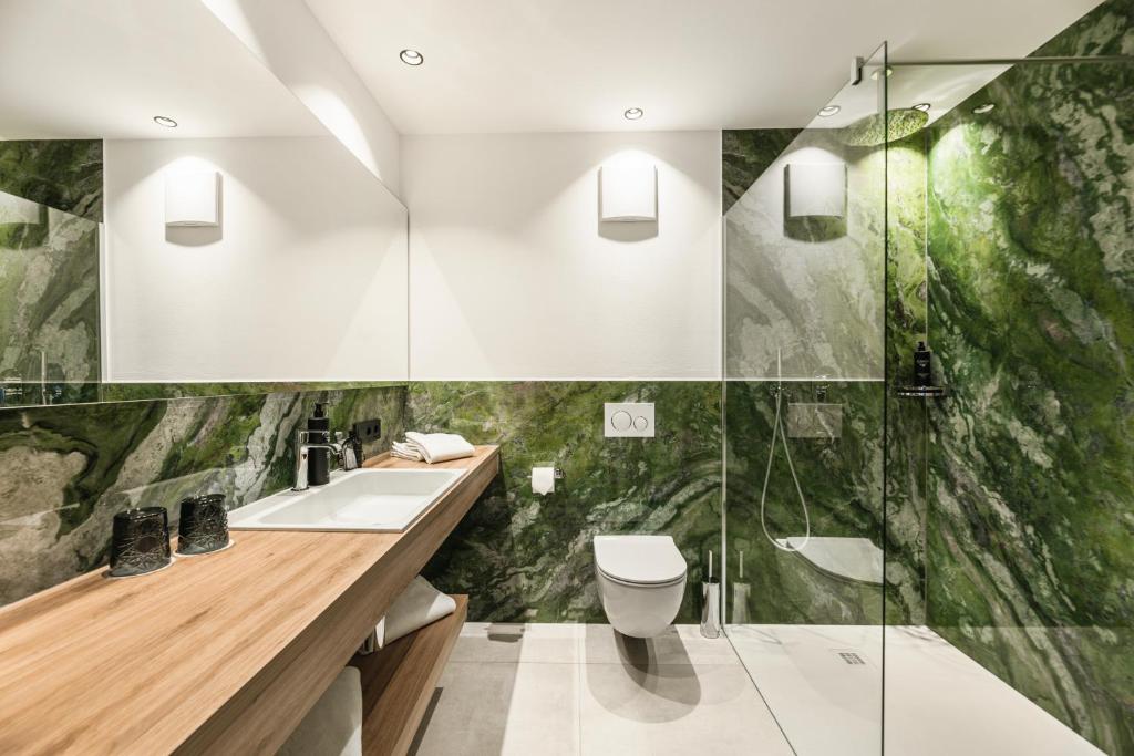Koupelna v ubytování Boutique Hotel Planlim