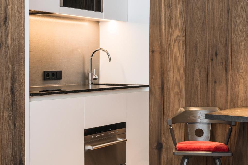 Kuchyň nebo kuchyňský kout v ubytování Boutique Hotel Planlim