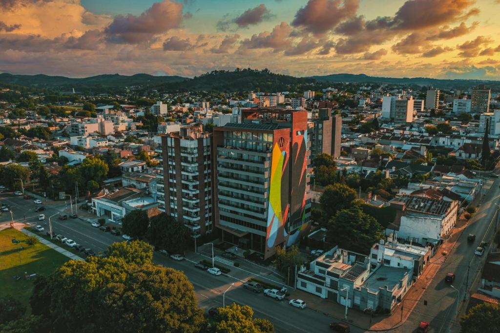 an aerial view of a city at sunset at Mulen Hotel Tandil in Tandil