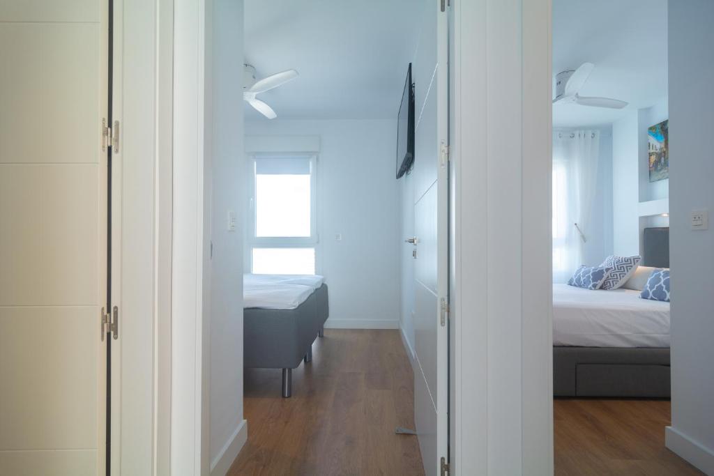 Posteľ alebo postele v izbe v ubytovaní Townhouse El Romeral